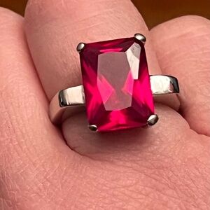 Costume jewelry faux ruby ring size 8. Silver tone